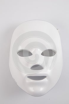 Color therapy mask glowing on the white background