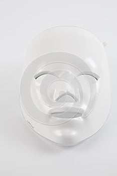 Color therapy mask glowing on the white background