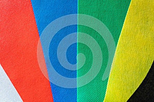 Color tissue samples background of white, red, blue, green, yellow and black colors. Different color swatches - Image