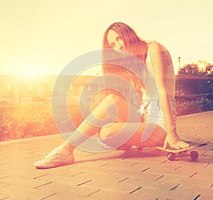 Color toned image og young girl sitting on her