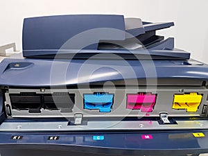 Color toners in the digital laser printer. (cyan, magenta, yellow, black)