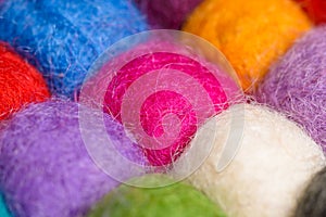 Color wool background - balls of synthetic wool yarn