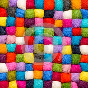 Color wool background - balls of synthetic wool yarn