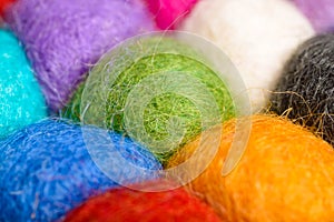 Color wool background - balls of synthetic wool yarn