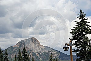Colorado mountain peak with street lantern entry