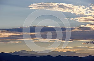 Colorado Mountains and clouds at sunset or dusk