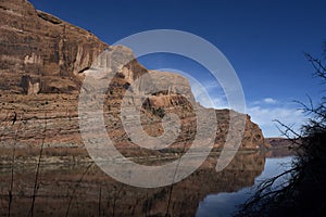 Colorado River Redrock Cliffs Summer Blue Skies and Clouds