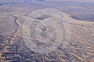 Colorado Rocky Mountains Aerial panoramic views from airplane of abstract Landscapes, peaks, canyons and rural cities in southwest