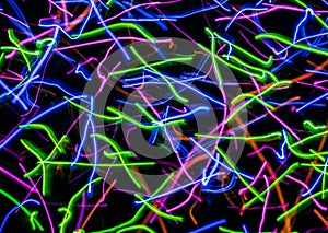 Colored abstract curved lines on a dark background.