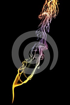 Colored abstract smoke isolated on black background.