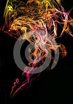 Colored abstract smoke isolated on black background.