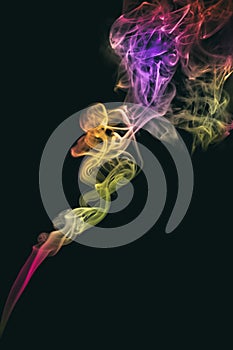 Colored abstract smoke isolated on black background.