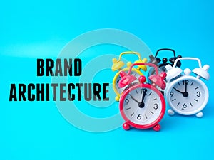 Colored alarm clock with text BRAND ARCHITECTURE