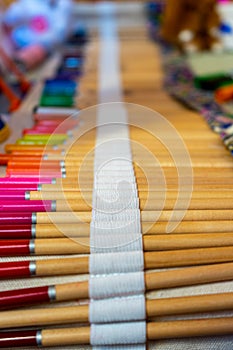 Colored artistic pencils in bag