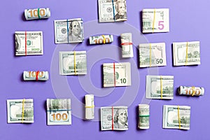 Colored Background with money american hundred dollar bills on top wiev with copy space for your text in business concept