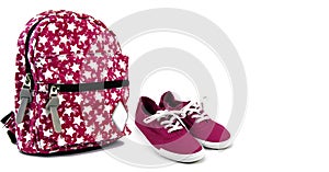 Colored backpack andsneakers,on a white background photo