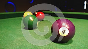 Colored balls for the game on the pool Billiards. The focus in the foreground