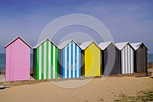 Colored beach huts on beach oleron french isle