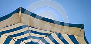 Colored beach umbrella photographed from below photo