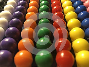 Colored beads arranged in rows, close-up abacus