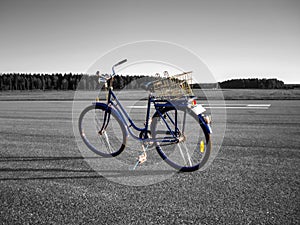 Colored bicycle, monochrome background