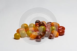 Colored bio Cherry Tomato. Isolated