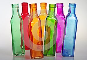 Colored bottles seem to dance.