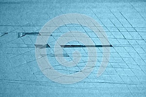 Colored cardboard damaged by cuts