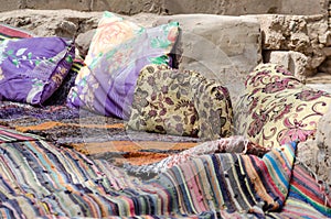 Colored carpets and pillows in a Bedouin village in Egypt Dahab South Sinai