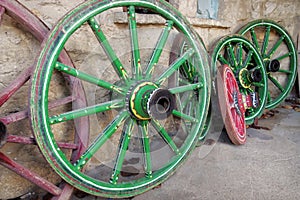 Colored cart wheels - Orthodox Monastery of the Transfiguration of God - Landmark attraction in Veliko Tarnovo, Bulgaria