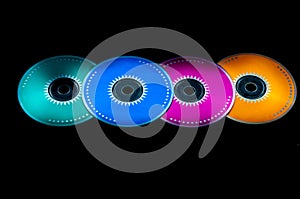 Colored cdrom on black background