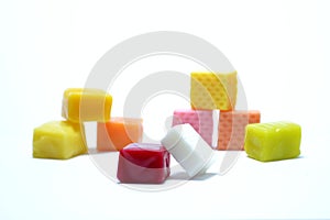 Colored chewing sweets on white background