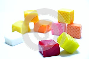 Colored chewing sweets on white background