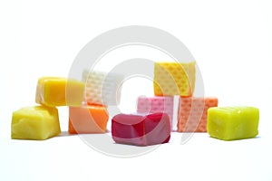 Colored chewing sweets on white background