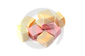 Colored chewing sweets on a white background.