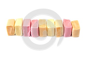Colored chewing sweets on a white background.