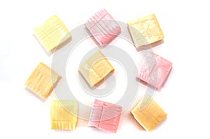 Colored chewing sweets on a white background.