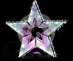 Colored Christmas star lights and ornaments in downtown of Bucharest