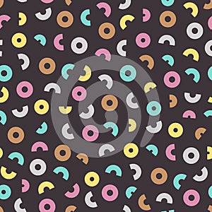 Colored circles and semicircles on a dark background.