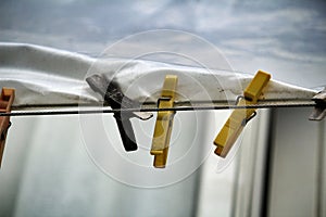 Colored clothespins on a clothesline in Lisbon