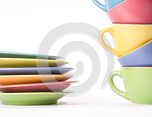 Colored coffee cups and dishes