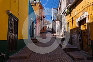 Colored colonial houses in old town of Guanajuato. Colorful alleys and narrow streets in Guanajuato city, Mexico. Spanish Colonial