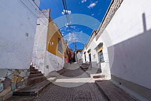 Colored colonial houses in old town of Guanajuato. Colorful alleys and narrow streets in Guanajuato city, Mexico. Spanish Colonial