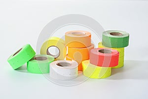 Colored commercial stickers in rollers. double scotch tape.