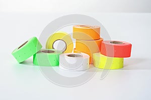 Colored commercial stickers in rollers. double scotch tape.