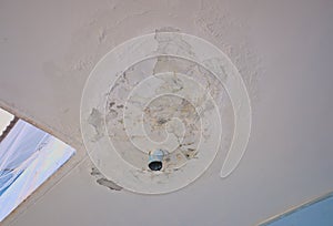 The colored concrete ceiling is fading from the humidity. drain from the ceiling Construction mistake,