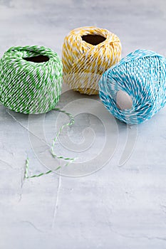 Colored cords, present wrapping and packing material