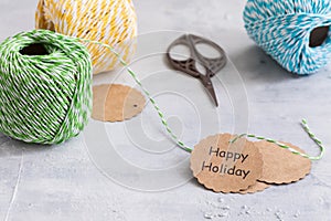 Colored cords with scissors, present wrapping and packing material