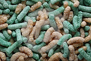 colored corn sticks close-up top view. Background and textures.