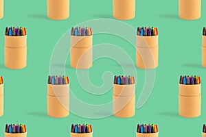 Colored crayons pattern composition pastel background. Waxy pencils eco box isometric. Back to school artistic education